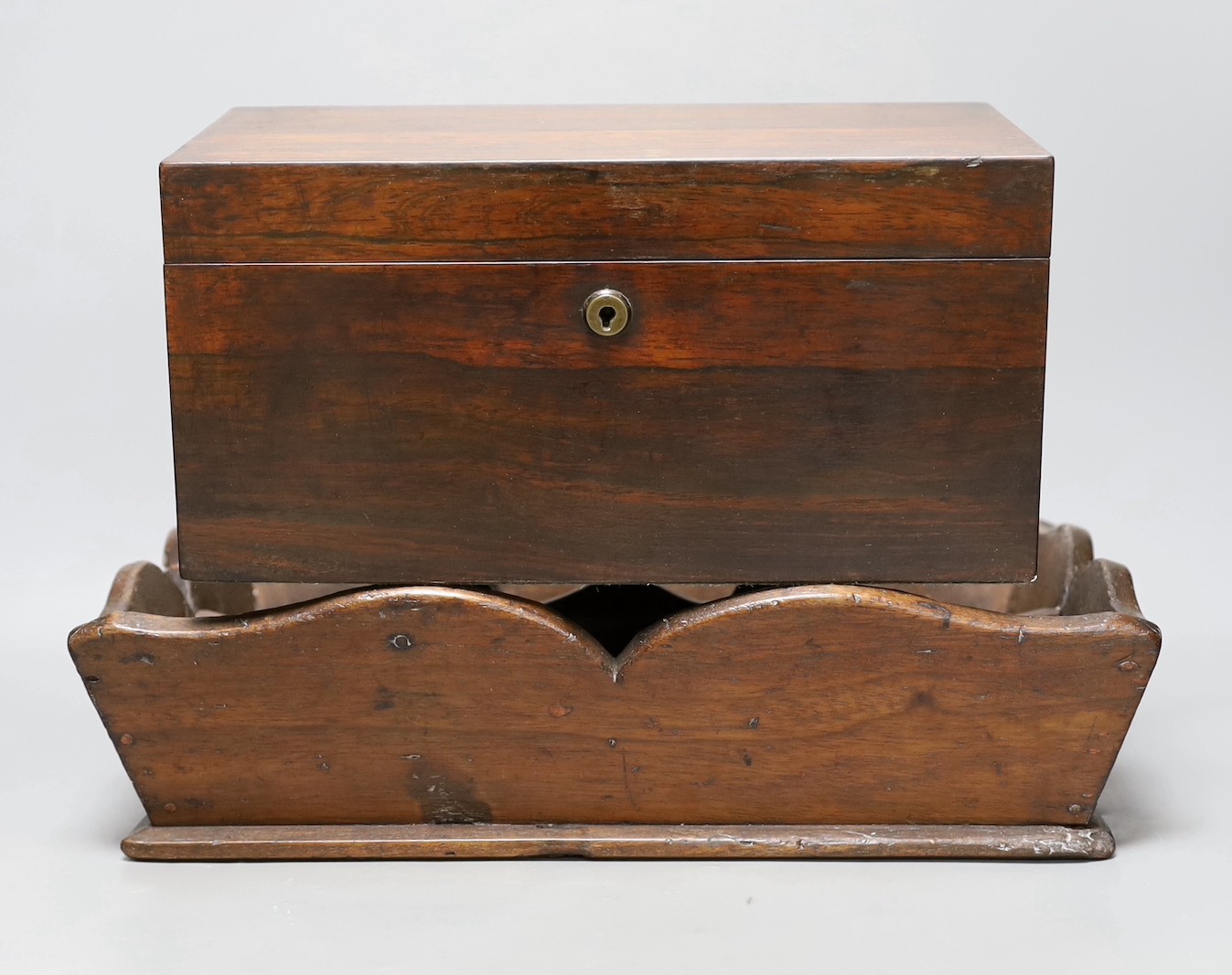 A 19th century rosewood tea caddy and a mahogany cutlery tray